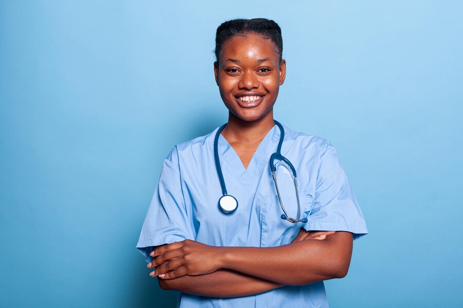 portrait-african-american-practitioner-nurse-smiling-camera-working-illness-expertise_482257-31387